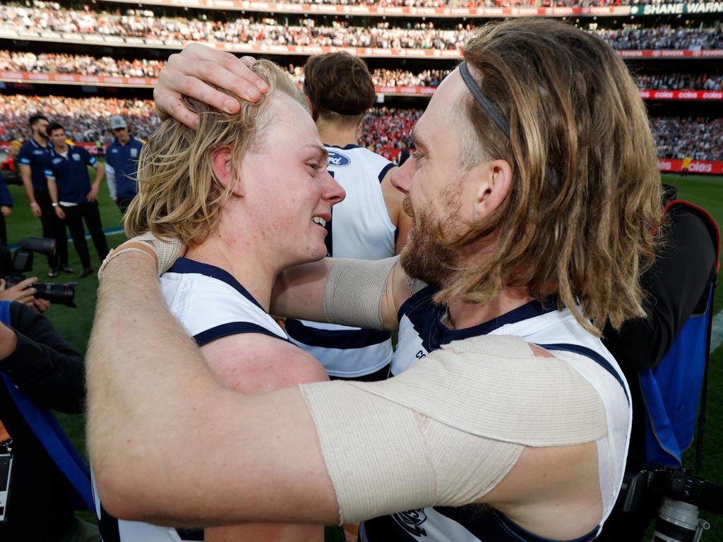 Cameron Guthrie of the Cats and brother Zach celebrate during the 2022 Toyota AFL Grand Final match between the Geelong Cats and the Sydney Swans. Picture: Michael Willson