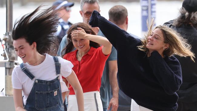 Playing around on set between takes. Madelyn Cline (dark blue jumper) and Freddie Prinze Jr (grey shirt and jacket) on the Watsons Bay set of I Know What You Did Last Summer. Picture: Rohan Kelly.