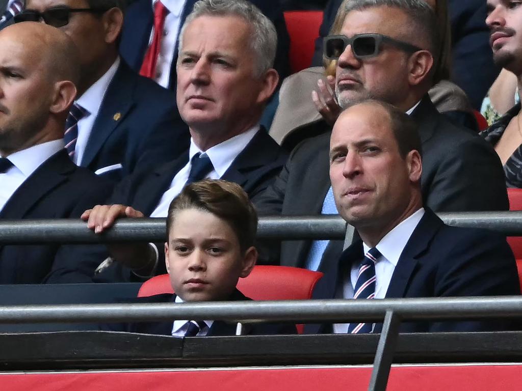 Britain's Prince George of Wales and his father Prince William attend the English FA Cup final football match between Manchester City and Manchester United. Picture: Ben Stansall / AFP