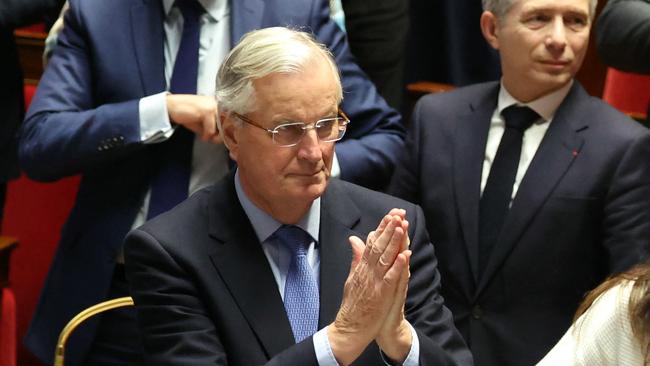 French Prime Minister Michel Barnier gestures after the result of the no-confidence vote at the National Assembly in Paris. French MPs voted to oust his government after just three months in office in a move which deepens a political crisis in the country.