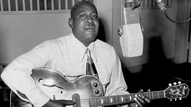 Arthur 'Big Boy' Crudup  in a recording studio circa 1945 in Chicago, Illinois. Photo: Getty.