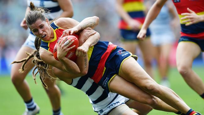 Chelsea Randall is tackled by Geelong’s Richelle Cranston during the AFLW preliminary final at Adelaide Oval. Picture: AAP David Mauriz