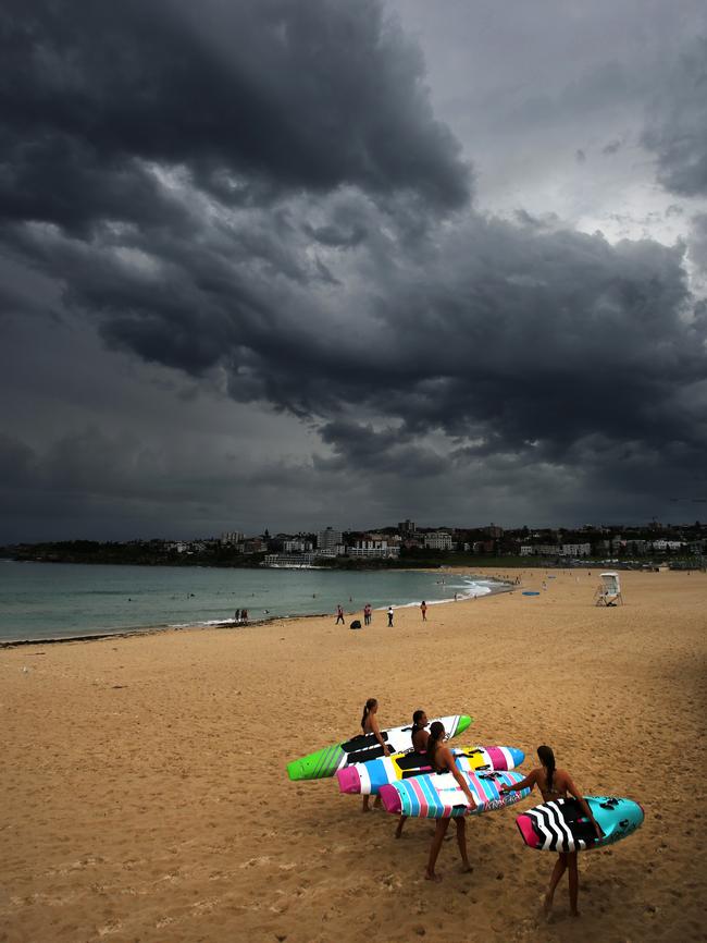 Dark clouds roll in over Bondi Beach this afternoon.  Picture: Bob Barker.