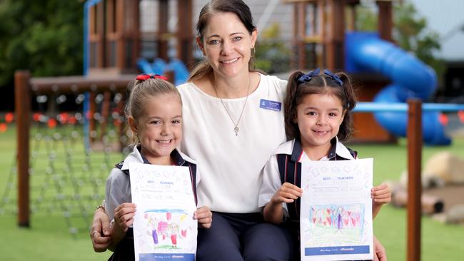 HOLDING FOR BEST TEACHER CAMPAIGN -  Suzanne Walker teachers year 1W, with her students L to R, Isla Kurzydlo 6yrs, and Ivie Rogers 6yrs, for the Best Teachers campaign, the year 1 primary students writing letters to their teacher, Lakes College, College St, North Lakes - on Thursday 15th May 2025 - Photo Steve Pohlner