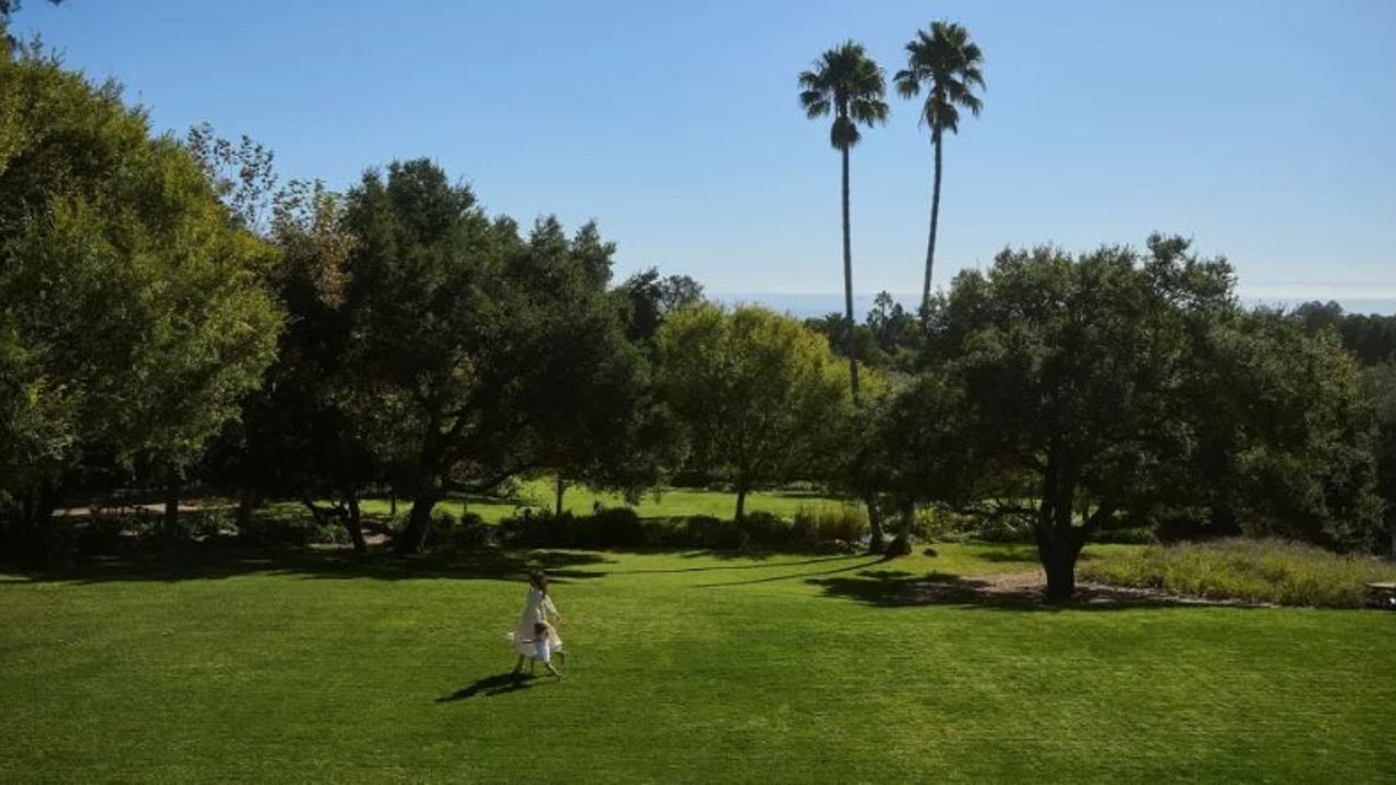 Meghan used this shot with Princess Lilibet in their garden for her As Ever branding – showing their two iconic palm trees.