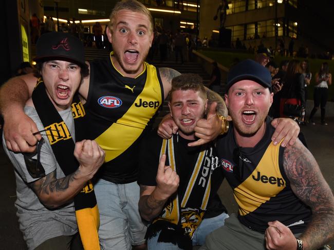 Richmond fans leaving the MCG after winning the semi-final. Picture: Tony Gough