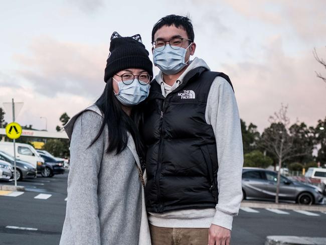 Emma and Kevin pictured at Costco, Casuala, wearing face masks to help protect themselves from COVID-19. Picture: Flavio Brancaleone