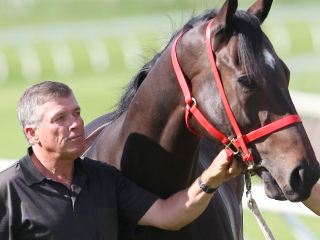 Love Rocks with trainer Steve Tregea and track rider Von Robertson Higgins.