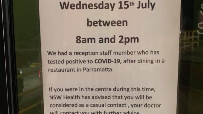 A note left on the front door of the Astley Medical Centre in St Marys after a receptionist tested positive for COVID-19.