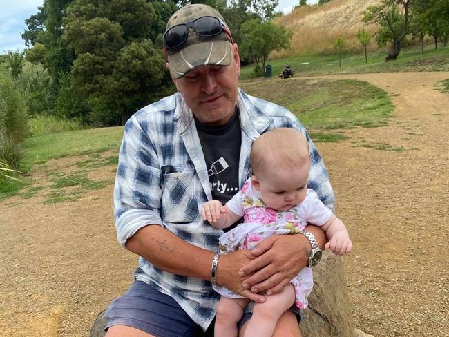 John Tscherkaskyj with his first grandchild at Richmond. Picture: Supplied