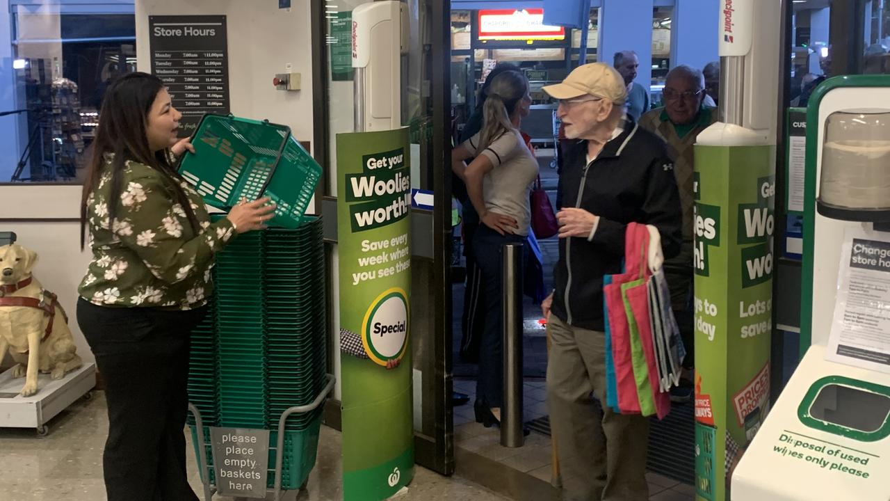 The first customer through the door at Woolworths Neutral Bay in Sydney.