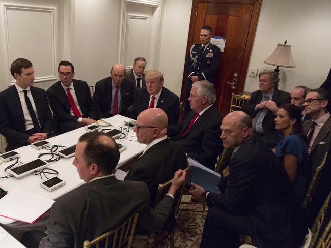 Donald Trump’s national security team (from left, clockwise) Jared Kushner, Steven Mnuchin, Wilbur Ross, Sean Spicer, Donald Trump, Rex Tillerson, Steve Bannon, Stephen Miller, Michael Anton, Dina Powell, Gary Cohn, Gen HR McMaster and Reince Priebus. Picture:AP.