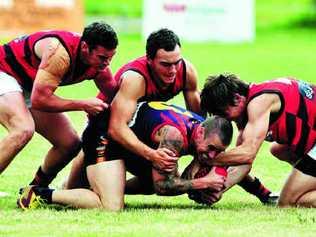 Luke Brauer, being tackled, says the Tigers are excited at the prospect of getting back on the winners’ list. Picture: Geoff Potter