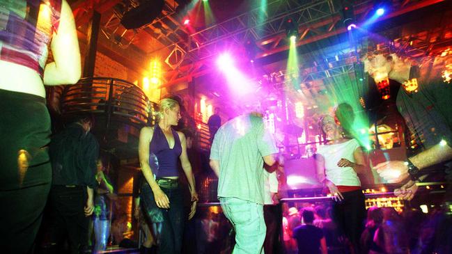 August 2001: Dancing at the Family nightclub, in Fortitude Valley. Picture: Steve Pohlner