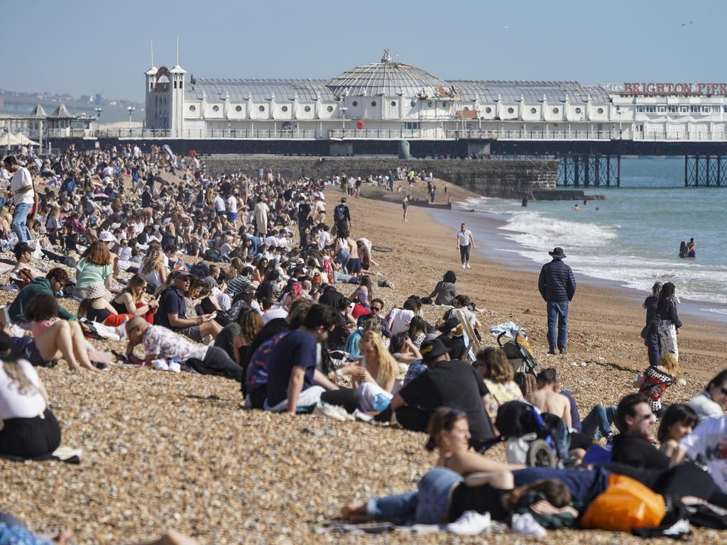 Crowds pack Brighton beach in England as 24C temperatures coincided with the easing of lockdown rules. Picture: Chris Eades/Getty Images