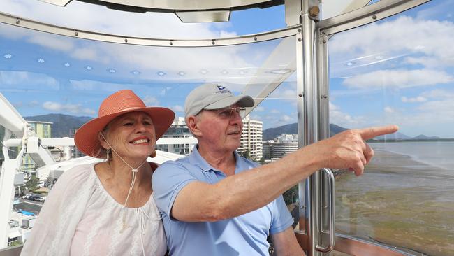 Jean Bibby and Ross Hebner from Auckland, New Zealand, take in the stunning views from the top of the ferris wheel. Picture: Brendan Radke