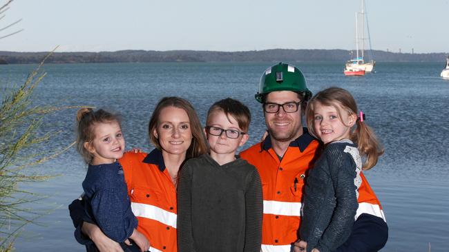 Mining family Dane and Sarah-Jane Sharp with their children Aleksandar, 7, Olivia, 6, and Elowyn, 3. Picture: Peter Lorimer.