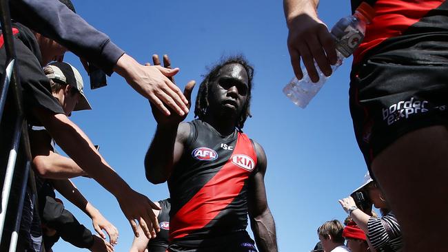 Anthony McDonald-Tipungwuti - pictured after a community series game against Geelong in Colac - is a fan favourite. Picture: Getty