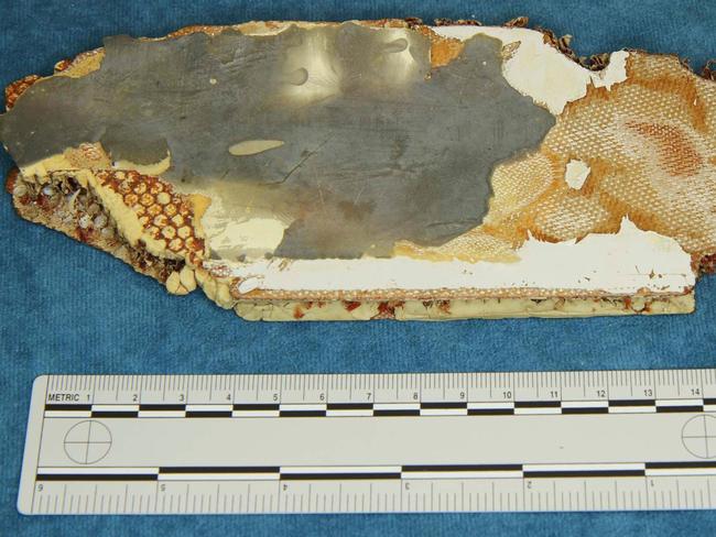 Possible debris from missing passenger jet MH370 handed over by a US amateur investigator. Picture: AFP/Australian Transport and Safety Bureau