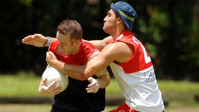 Ireland took on Australia on St Patrick’s Day at Kahlin Oval in 2009, with Shane Mackey wrapped up by Scott Ward. Picture: Stuart Walmsley.Then Palmerston coach Russell Jeffrey with junior development officer Jason Cockatoo overlooking Southern Cross Oval in 2009. Picture: Justin Sanson