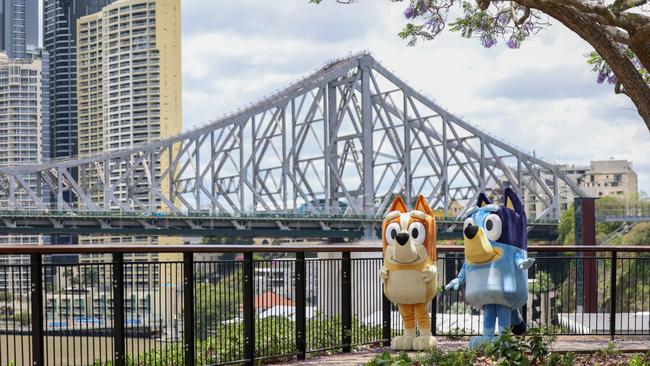 Bingo and Bluey check out the Brisbane Story Bridge. Picture: Peter Wallis.