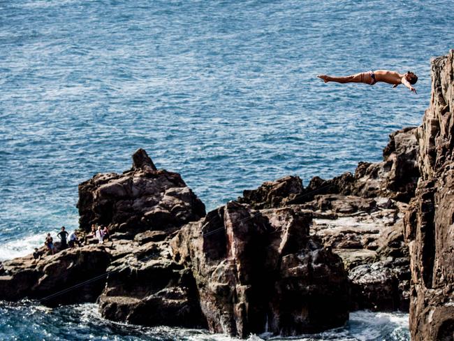 Orlando Duque of Colombia diving from the 28 metre platform during the eighth stop of the Red Bull Cliff Diving World Series at Shirahama, Japan. Picture: AFP PHOTO / RED BULL / Dean TREML