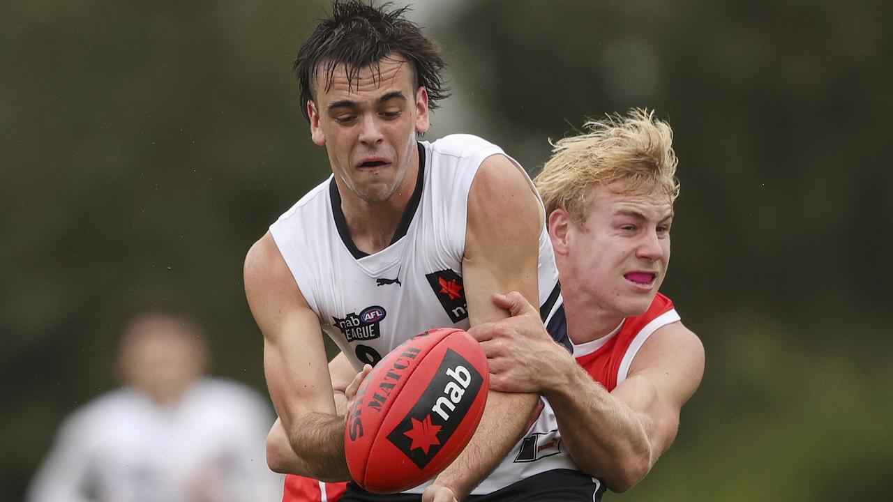 William Edwards chases down knights player Patrick Dozzi.