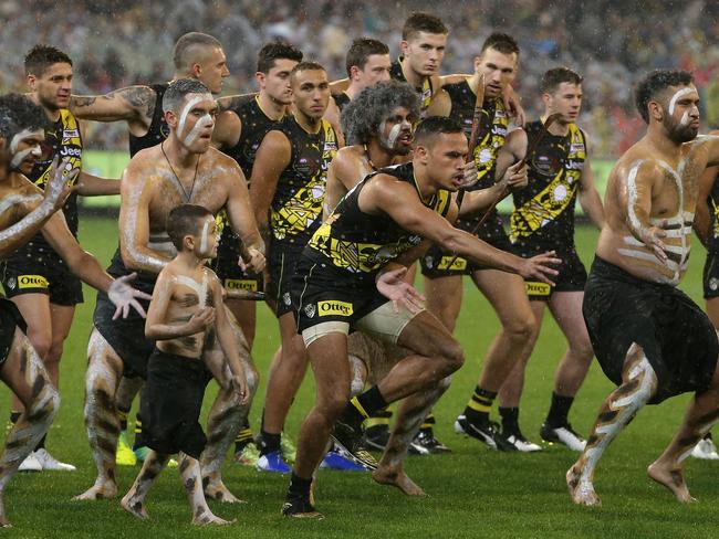 Sydney Stack of the Tigers leads the pre match activites during the Round 10 AFL match between the Richmond Tigers and the Essendon Bombers at the MCG in Melbourne, Saturday, May 25, 2019.  (AAP Image/Mark Dadswell) NO ARCHIVING, EDITORIAL USE ONLY