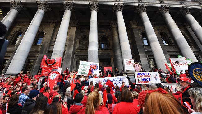 Public teachers from across South Australia rally on the steps of Parliament House. Picture: AAP/Mark Brake