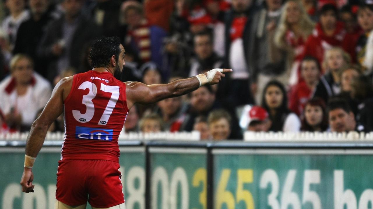 Adam Goodes points into the crowd alerting security to comments made during the 2013 match.