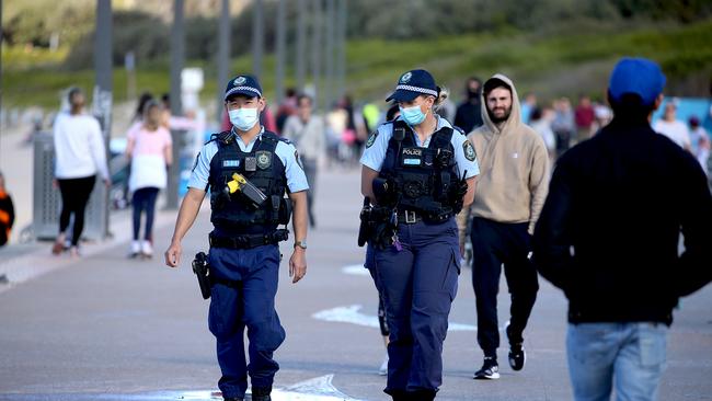 NSW Police on patrol at Sydney's Maroubra Beach, where an illegal party in the suburb resulted in at least 16 infections. Picture: NCA NewsWire / Nicholas Eagar