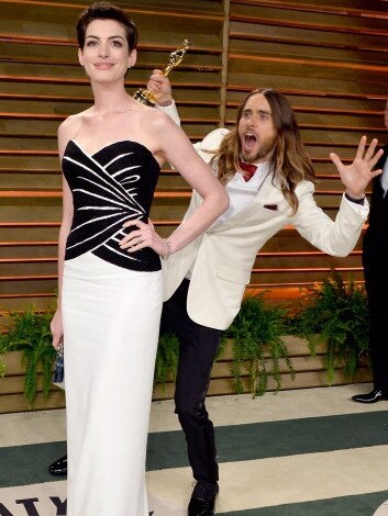 Anne Hathaway and Jared Leto attend the 2014 Vanity Fair Oscar Party on March 2, 2014 in West Hollywood, California. Picture: Getty