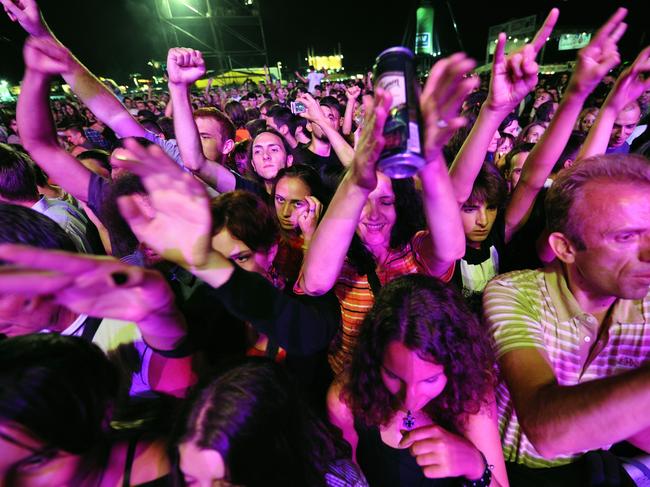 Belgrade, Serbia - August 18, 2010: Young people are enjoying concert of Serbian band Partibrejkers during Belgrade Beer Fest. Photo: iStock