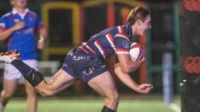Easts player Hunter Ryan crashes scoring one of his three tries.