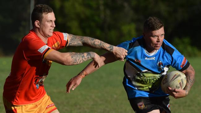 BOWING OUT: Woolgoolga Seahorses hooker Michael Grant (right) tries to get around Coffs Harbour Comets captain Brad Collinson when the two sides clashed in round six. The Seahorses will no longer be fielding senior teams in 2020.