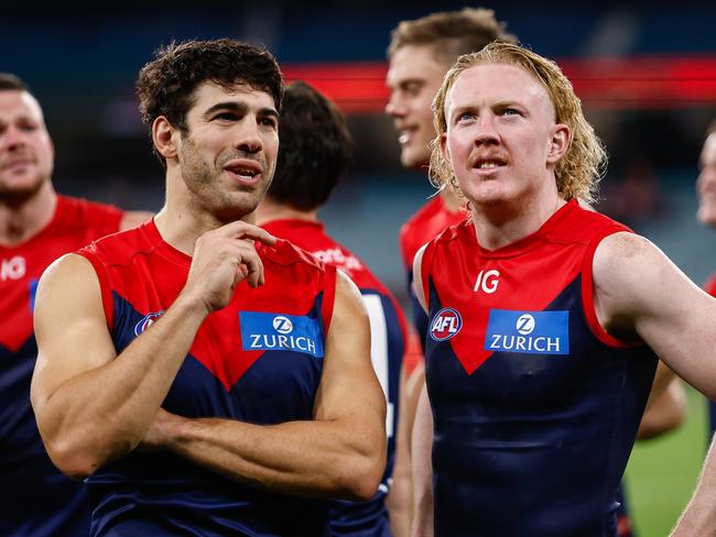 MELBOURNE, AUSTRALIA - APRIL 29: Clayton Oliver and Christian Petracca of the Demons are seen during the 2023 AFL Round 07 match between the Melbourne Demons and the North Melbourne Kangaroos at the Melbourne Cricket Ground on April 29, 2023 in Melbourne, Australia. (Photo by Dylan Burns/AFL Photos via Getty Images)