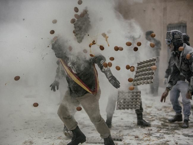 People - Second Prize, Stories Picture: Antonio Gibotta, Agenzia Controluce Title: Enfarinat Story: On 28 December each year, the “Floured War” takes place in Ibi in the province of Alicante, Spain. During the festival, the citizens are divided into two groups: the ‘Enfarinat’ (the floured) group simulates a coup d’etat and a second group tries to calm the rebellion. The teams play with flour, water, eggs and colored smoke bombs. The 200-year-old tradition is known as “Els Enfarinats”, marking the biblical Massacre of the Innocents by King Herod.