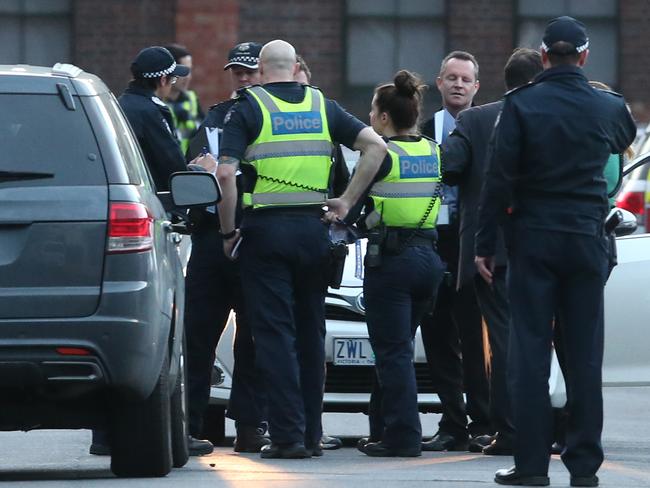 Police at the scene. Picture: David Crosling