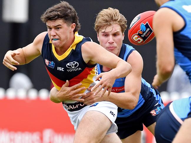 Ned McHenry shakes a tackle from Sturt’s Sam Colqhoun at Unley Oval during the SANFL season this year. Picture: TOM HUNTLEY