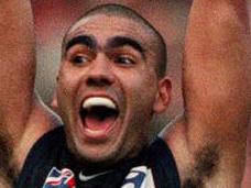 SEPTEMBER 18, 1999 : Justin Murphy celebrates as siren sounds to end Carlton v Essendon second AFL preliminary final at MCG in Melbourne, 18/09/99. Pic George Sal. Australian Rules F/L