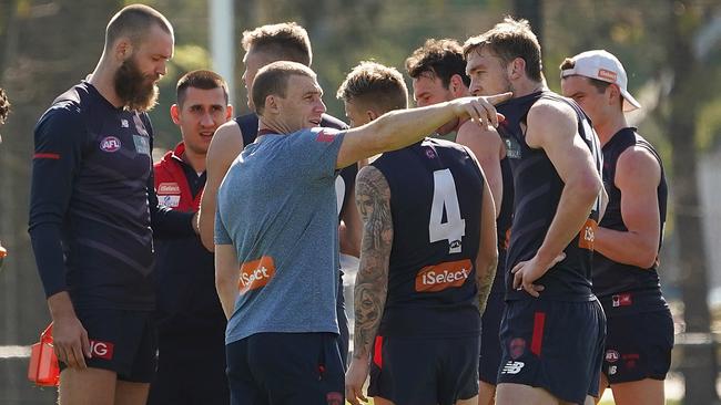 Simon Goodwin talks to Oscar McDonald at Melbourne training.