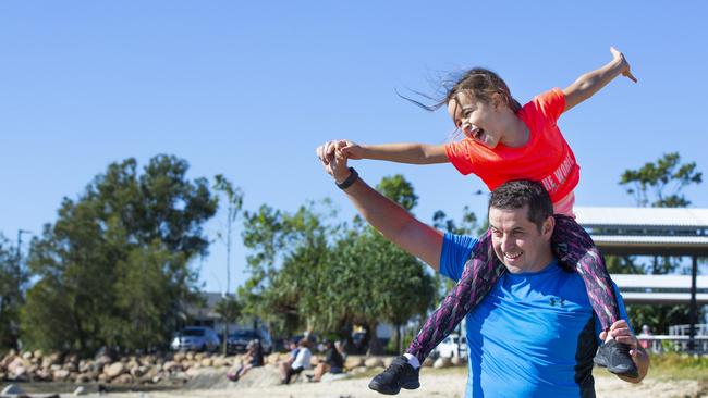 Darran Whelan with his daughter Ellie-Mae enjoying the foreshore. Picture: Renae Droop