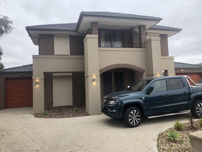 A Caroline Springs property and Volkswagen Amarok seized by the task-force. Picture: AFP