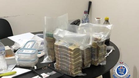 Some of the items and cash seized by police during their raids. Picture: NSW Police