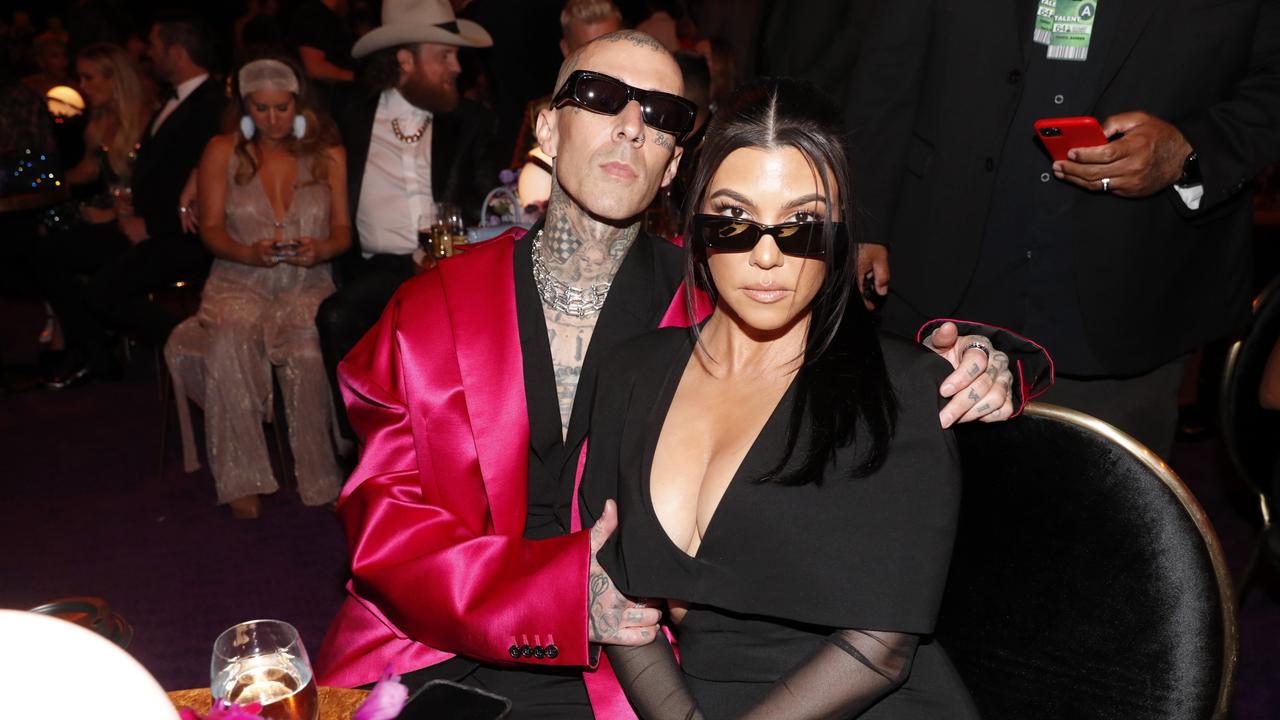 Travis Barker and Kourtney Kardashian toast to the 64th Annual GRAMMY Awards with Grey Goose vodka. (Photo by Jerod Harris/Getty Images for The Recording Academy)