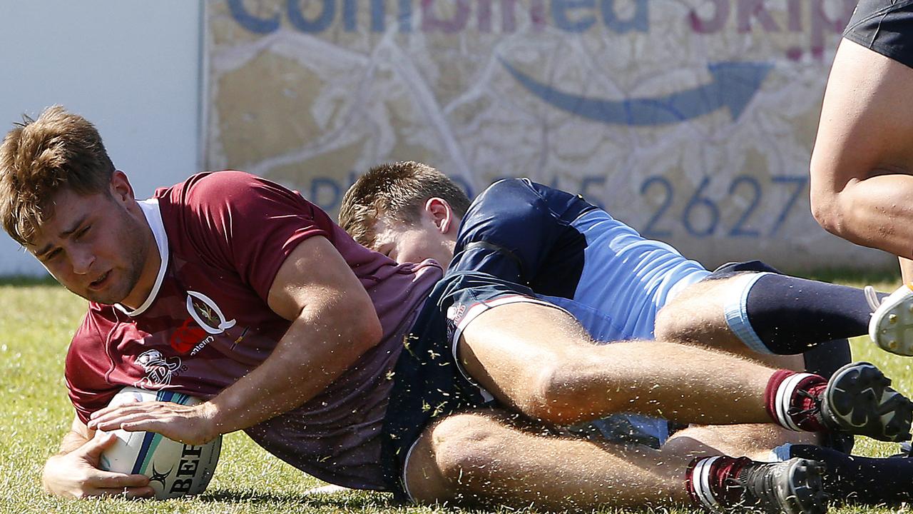 QLD Reds' Xavier Rubens gets over the line for a try. Junior Rugby Union. Under 18s NSW Waratahs v Queensland Reds. Picture: John Appleyard