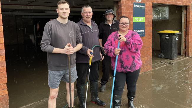 Mark Larkins, John Larkins, Syd Burton and Irena Ibrahim all share a building on Newbridge Road, and are pitching together to clean up their units on July 4, 2022 for the third time in four months. Picture: Paul Brescia/NewsLocal