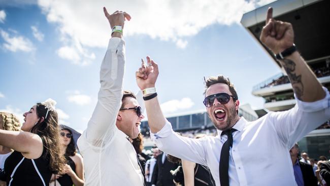 Darby Day Racegoers enjoying the sun at Flemmington . Picture: Jason Edwards DerbyColour15