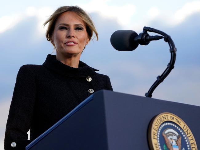 (FILES) In this file photo taken on January 20, 2021, US First Lady Melania Trump speaks before boarding Air Force One at Joint Base Andrews in Maryland. - Former US First Lady Melania Trump on December 16, 2021, launched her own NFT platform, the latest public figure to join the crypto boom. A non-fungible token (NFT) is a digital object that can be a drawing, animation, piece of music, photo, or video with a certificate of authenticity created by blockchain technology. This authentication by a network of computers is considered inviolable. A portion of the proceeds from Melania Trump's NFT collection will be used to help children in foster care. (Photo by ALEX EDELMAN / AFP)