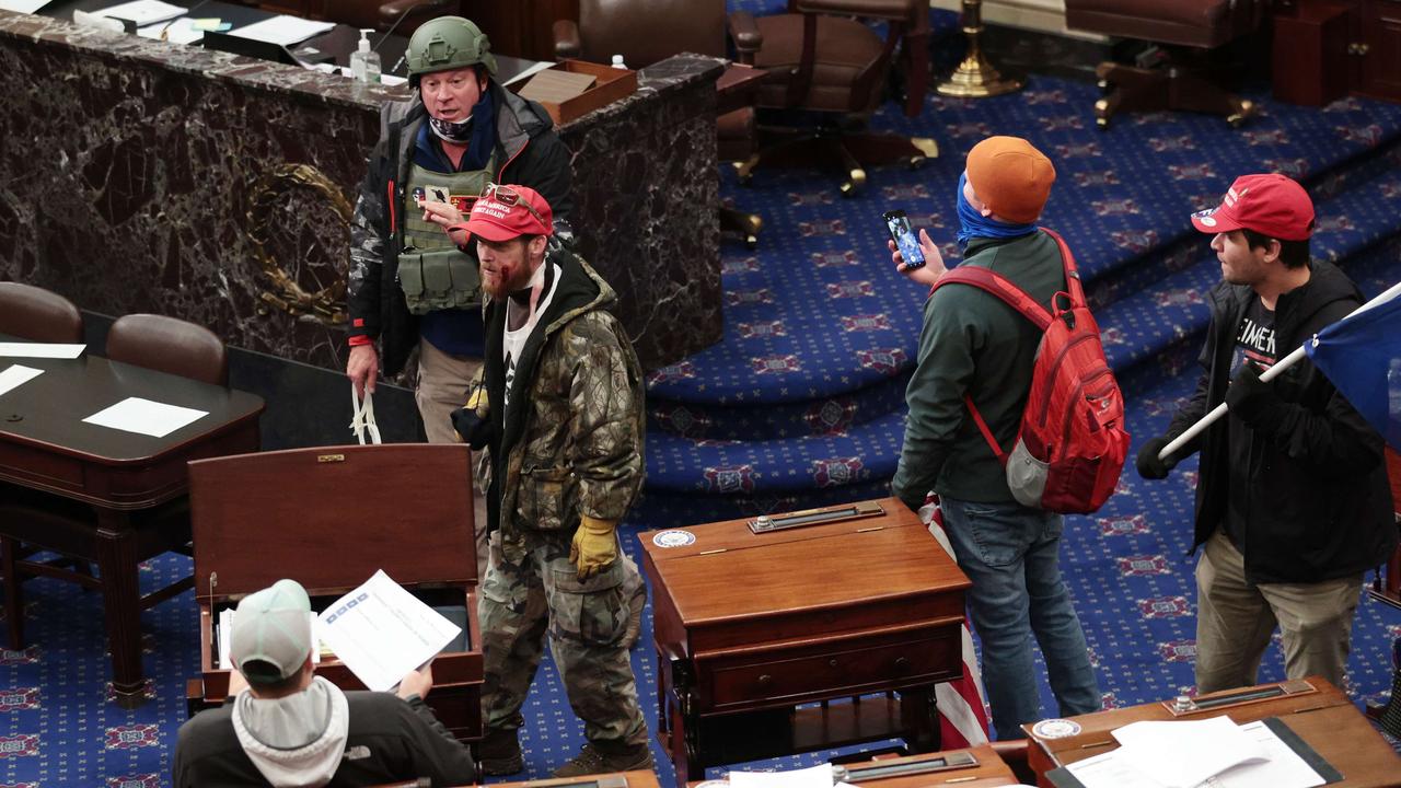 Images from inside the Senate Chamber appear to show some rioters with body armour, potentially weapons and more flex-cuffs. Picture: Win McNamee/Getty Images/AFP.